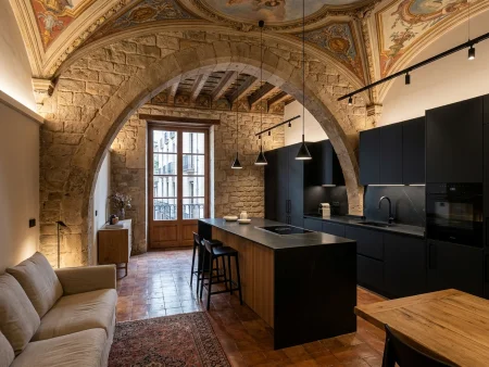 Reforma integral completa en piso histórico del Gótico con arcos de piedra recuperados